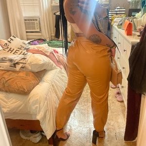faux leather tan pants size large